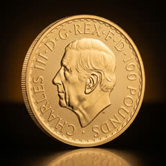 Royal Mint Britannia gold coin, portrait side, angled showing the reeded edge