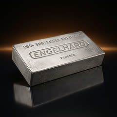 Engelhard 100 oz silver bar lying down, seen at a three-quarter angle to show how thick the block is