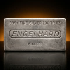Engelhard 100 oz silver bar, front face straight on, with the line 999+ FINE SILVER 100 TR. OZ., the ENGELHARD name in a rounded outline and a serial number