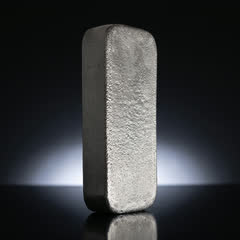 Johnson Matthey 100 oz silver bar turned to show its rough cast back and thick dark side