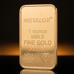 Metalor 1 oz gold bar on its own, front, turned slightly to show its thin edge