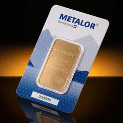 Metalor 1 oz gold bar in its white and blue assay card, front, turned to a side angle