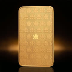 Back of the Royal Canadian Mint 1 oz gold bar on its own, rows of small maple-leaf emblems with a larger one in the centre
