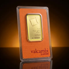 Valcambi gold bar in its orange assay card, front, turned to a side angle